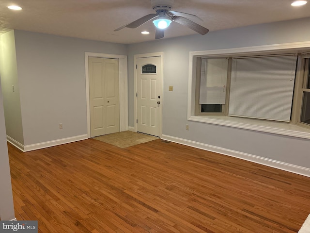 entrance foyer featuring hardwood / wood-style floors and ceiling fan