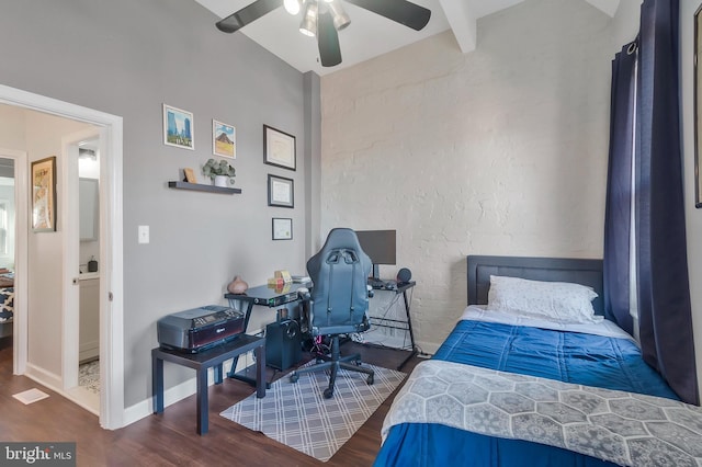 bedroom featuring beamed ceiling, ceiling fan, and dark wood-type flooring