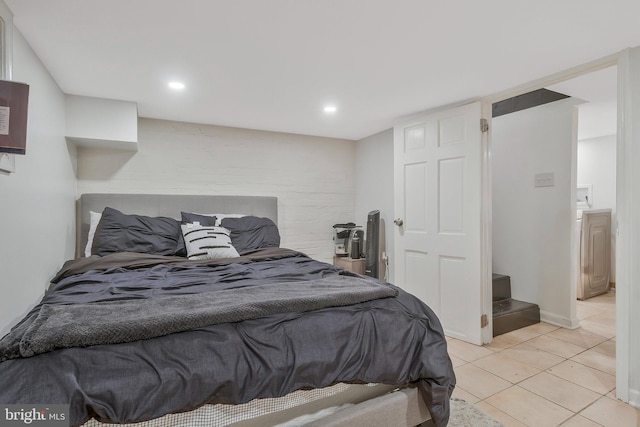 bedroom with light tile patterned flooring