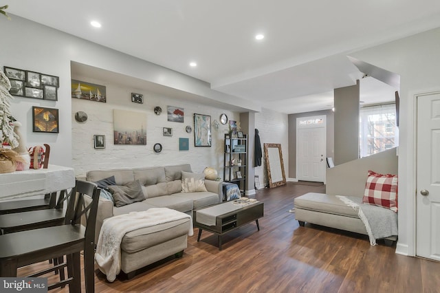 living room featuring dark wood-type flooring