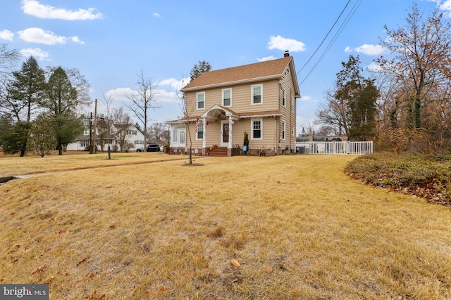 view of front of property with a front yard