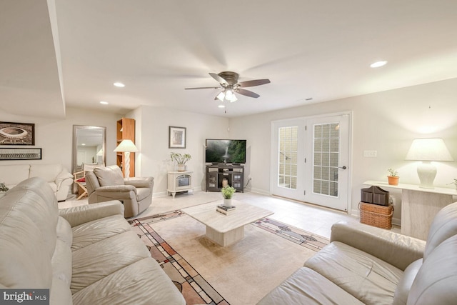 living room featuring ceiling fan