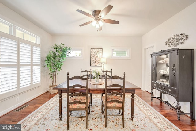 dining space featuring hardwood / wood-style flooring and ceiling fan