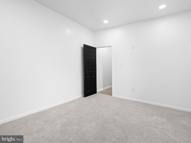 empty room with carpet floors