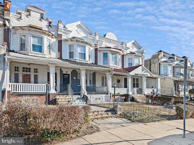 view of property with a porch