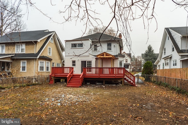 rear view of property with a deck