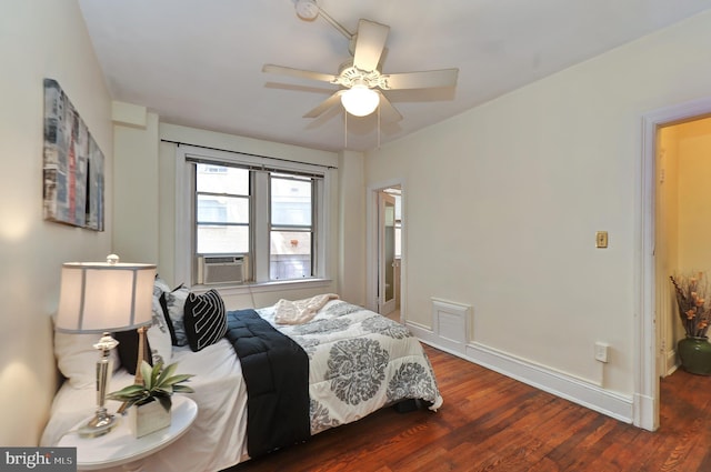 bedroom featuring ceiling fan and dark wood-type flooring