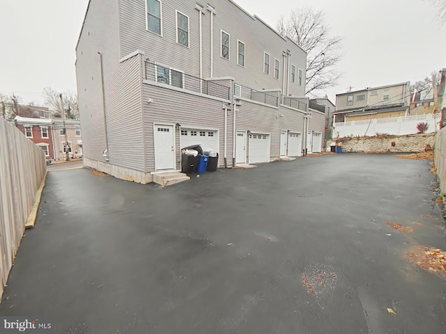 exterior space with a garage