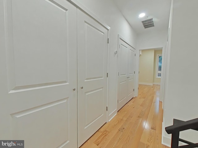 hallway featuring light hardwood / wood-style floors