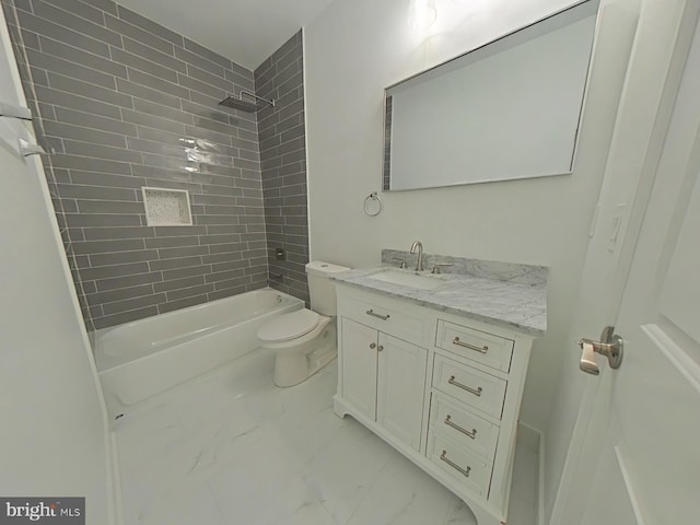 full bathroom with vanity, toilet, and tiled shower / bath combo