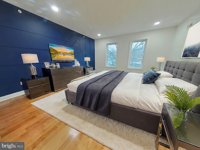 bedroom with wood-type flooring