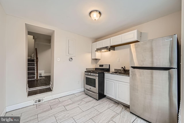 kitchen with white cabinetry, sink, and appliances with stainless steel finishes