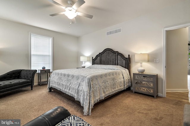 carpeted bedroom with ceiling fan