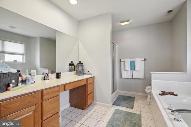 full bathroom featuring tile patterned floors, vanity, toilet, and shower with separate bathtub