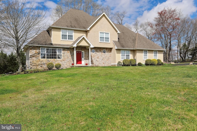 view of front of home featuring a front lawn