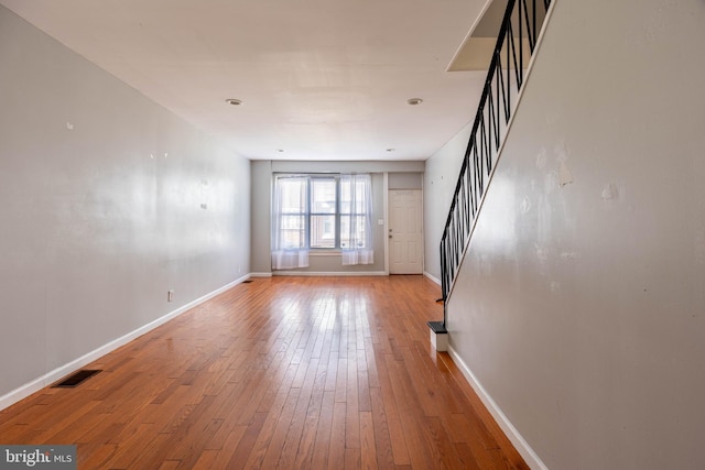 unfurnished room featuring light wood-type flooring