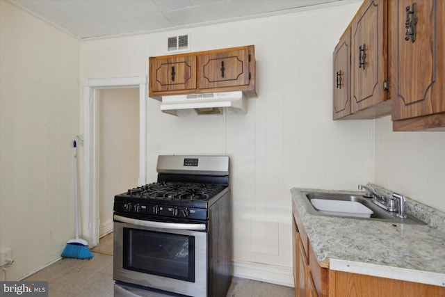 kitchen with stainless steel range with gas cooktop and sink