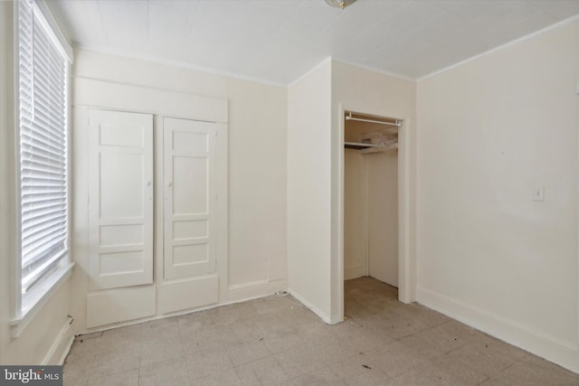 unfurnished bedroom featuring a closet