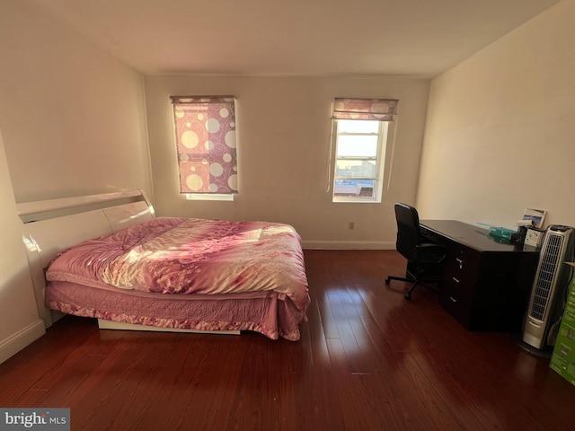 bedroom featuring dark hardwood / wood-style floors