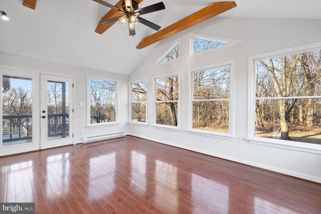 unfurnished sunroom with lofted ceiling with beams, a healthy amount of sunlight, and a baseboard heating unit