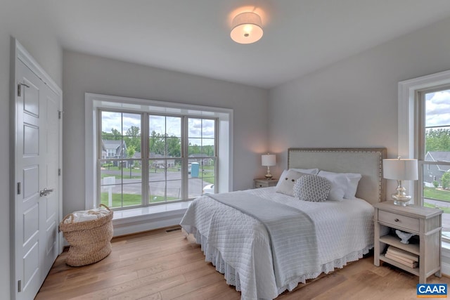 bedroom featuring light wood-type flooring