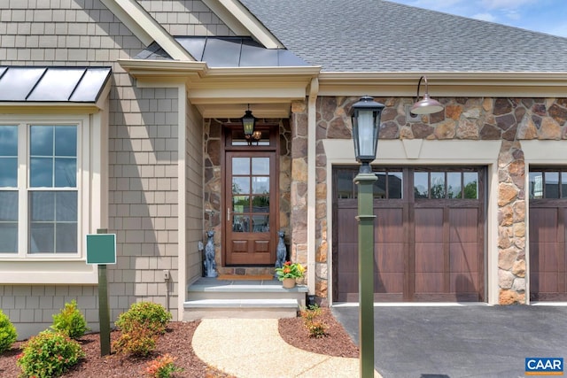 property entrance featuring a garage