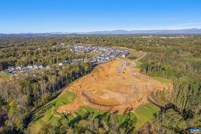 drone / aerial view featuring a mountain view