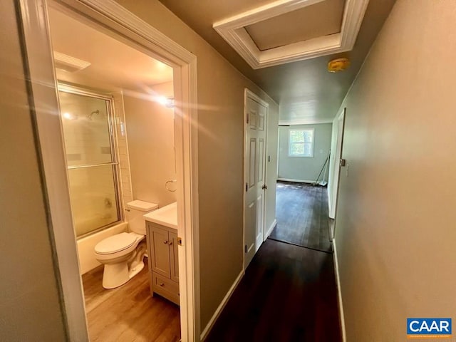 corridor featuring dark hardwood / wood-style floors