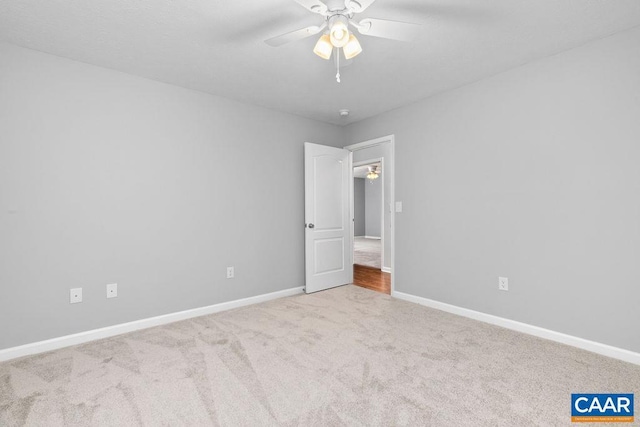 unfurnished bedroom with ceiling fan and light carpet