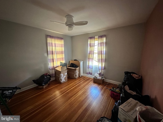 miscellaneous room with ceiling fan and hardwood / wood-style floors