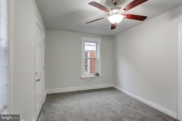 unfurnished bedroom featuring carpet floors and ceiling fan