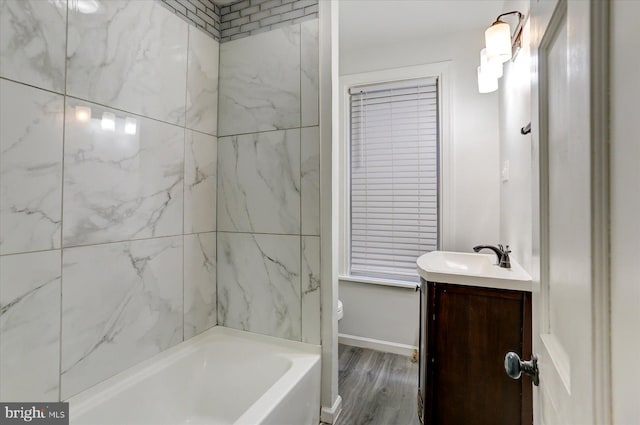 bathroom with hardwood / wood-style floors, vanity, and toilet