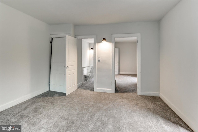 unfurnished bedroom with carpet