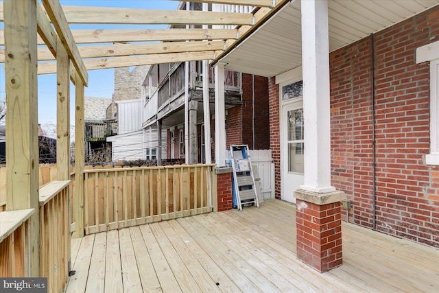 wooden terrace featuring a pergola