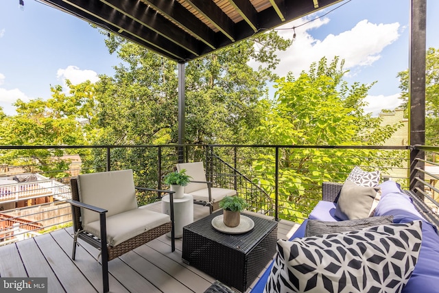 balcony featuring outdoor lounge area