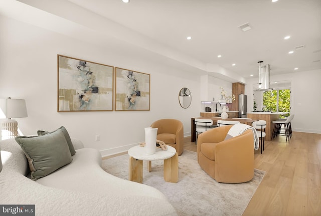 living room featuring light hardwood / wood-style floors