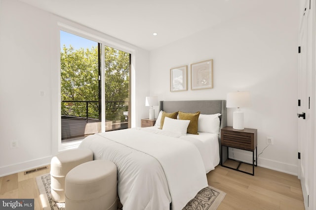 bedroom featuring light hardwood / wood-style floors