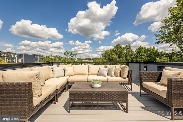 wooden terrace featuring outdoor lounge area