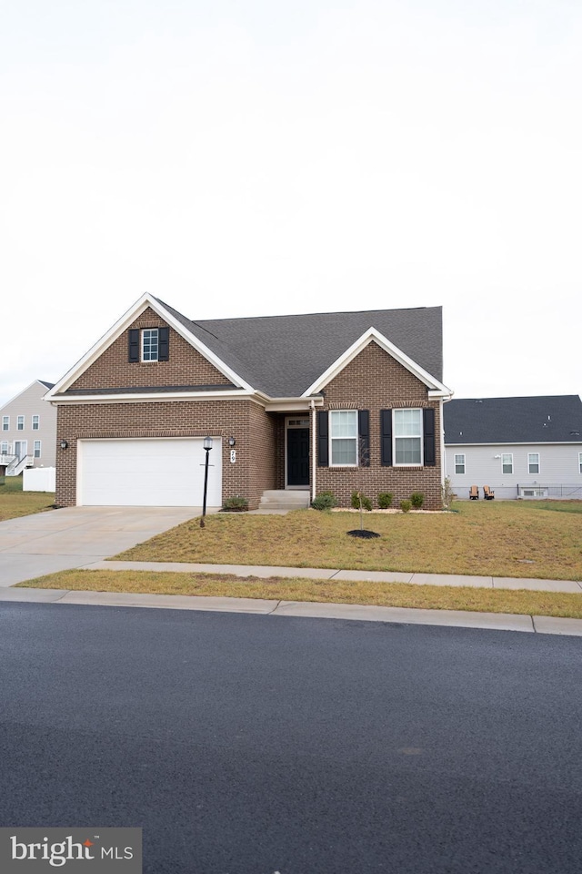 single story home featuring a garage and a front lawn