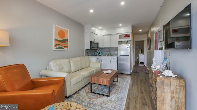 living room with wood-type flooring