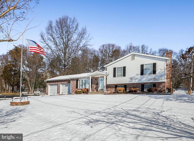 split level home with a garage