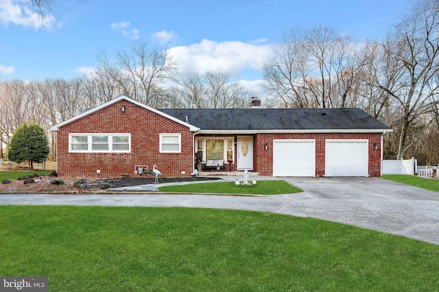 ranch-style house with a garage and a front yard