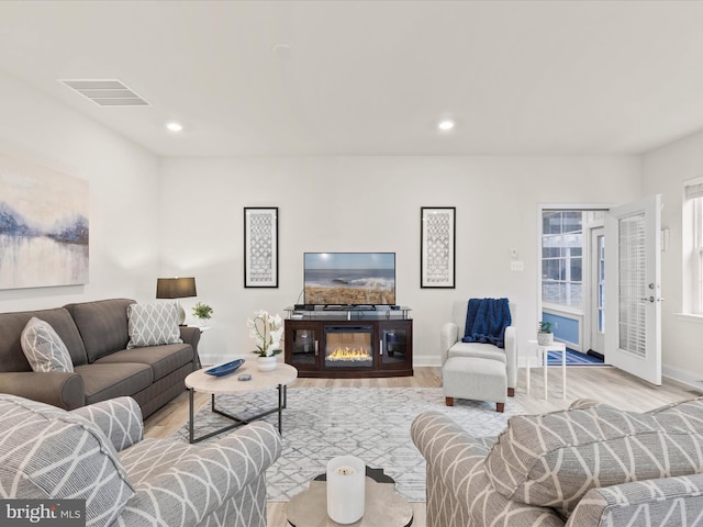 living room with light wood-type flooring