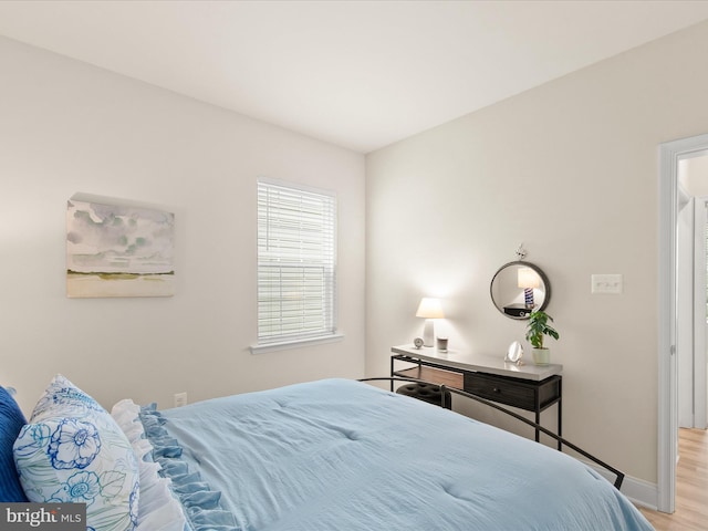 bedroom featuring light hardwood / wood-style floors