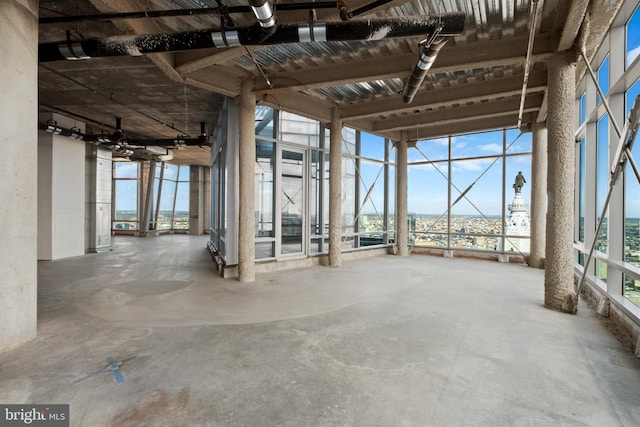 miscellaneous room with plenty of natural light and concrete flooring