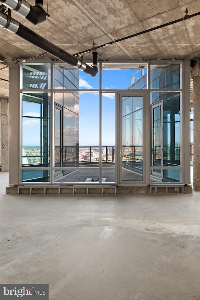 miscellaneous room with concrete flooring