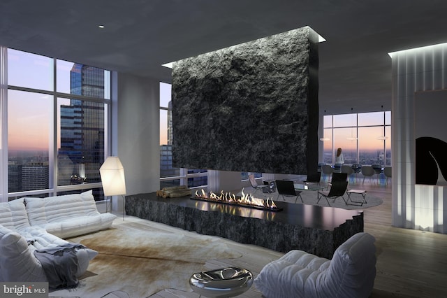 living room featuring hardwood / wood-style floors and floor to ceiling windows