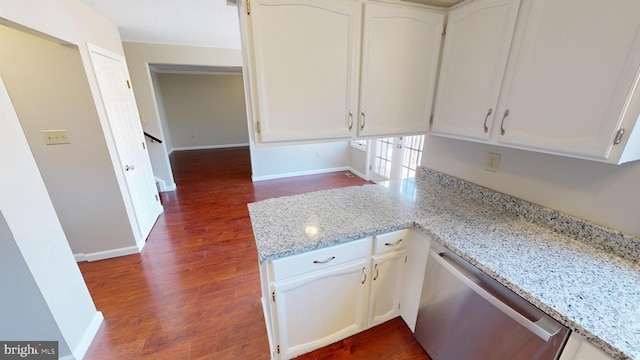 kitchen with dishwasher, white cabinets, light stone counters, and dark hardwood / wood-style floors