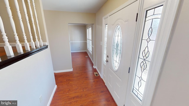 foyer featuring dark hardwood / wood-style flooring