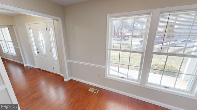 foyer entrance featuring hardwood / wood-style flooring